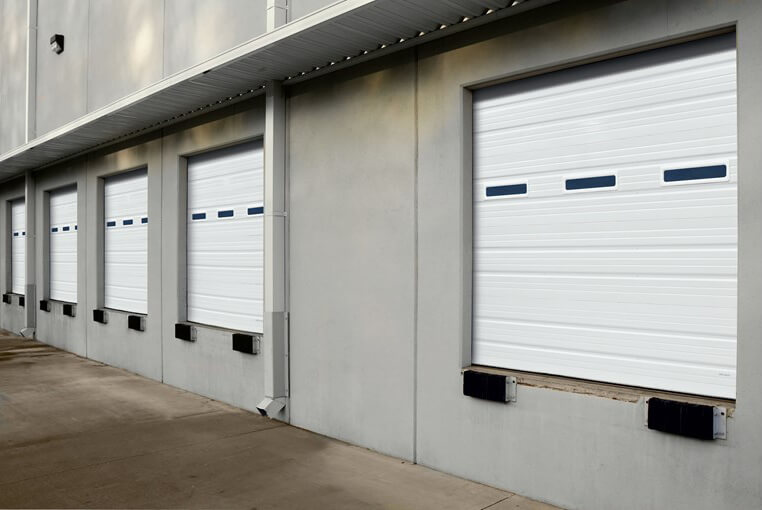 A long shot of Ribbed Panel doors of a Garage